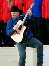 Garth Brooks - onstage - acoustic guitar